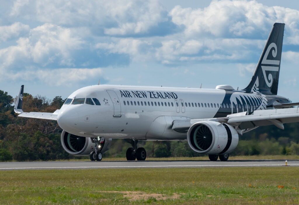 An Air New Zealand flight touches down at Hobart Airport.