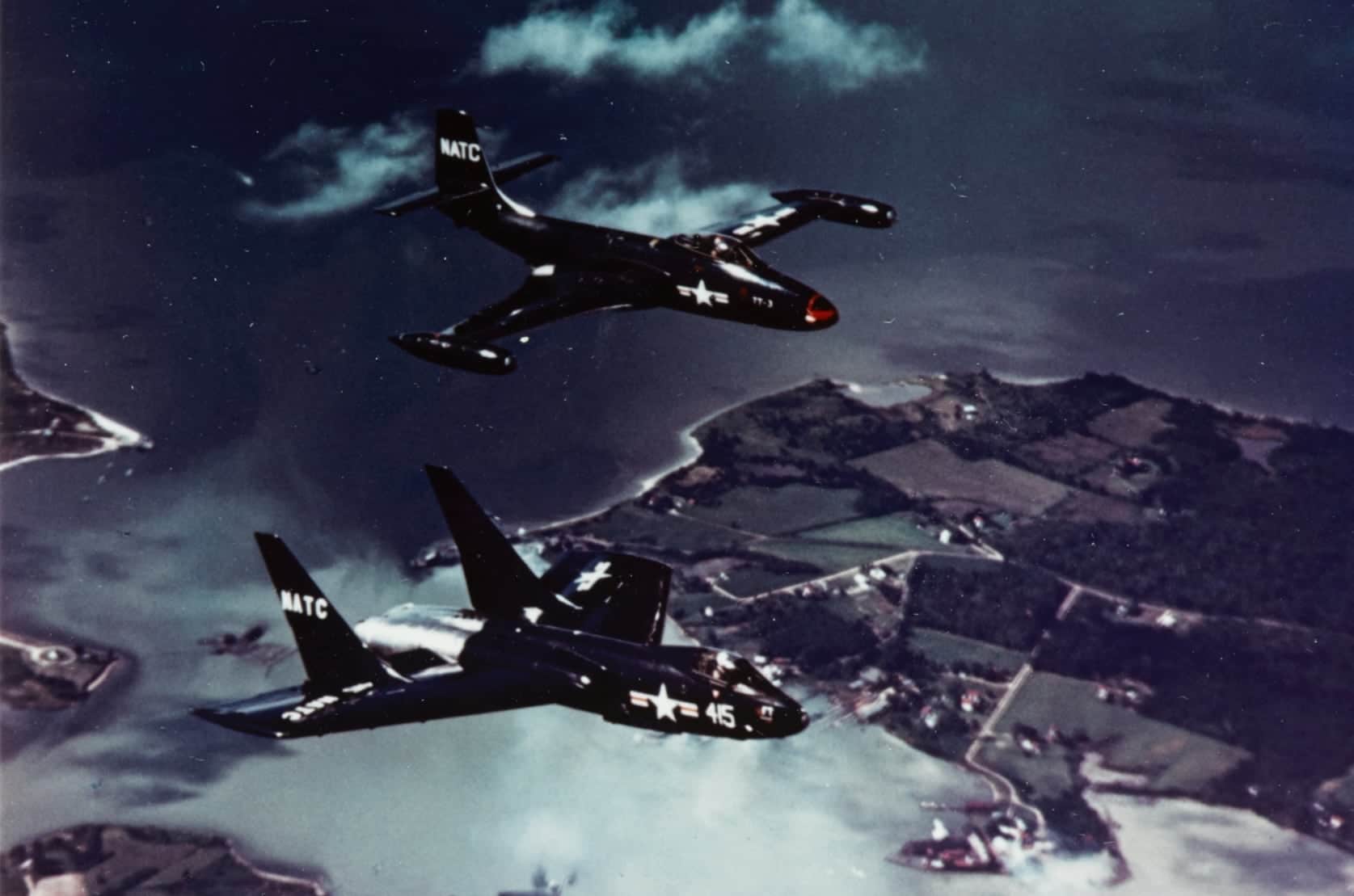 Cutlass flying with a Banshee.