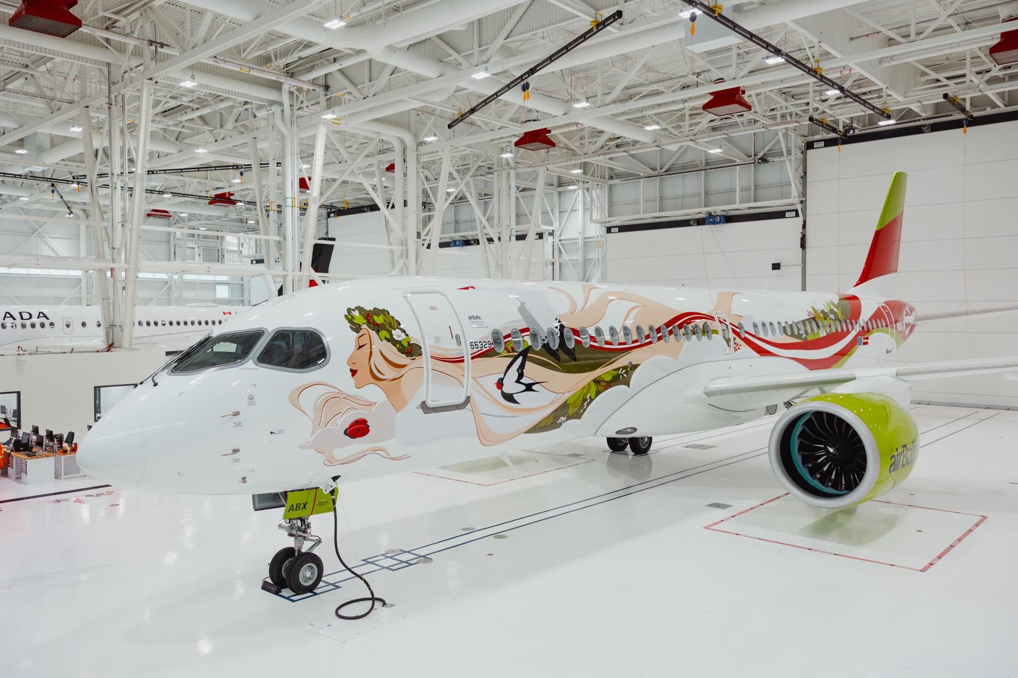 airBaltic's special 50th Airbus A220-300 livery in Mirabel, Canada