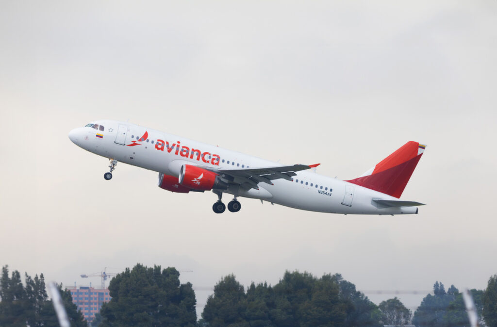 An Avianca A320 climbs after takeoff.